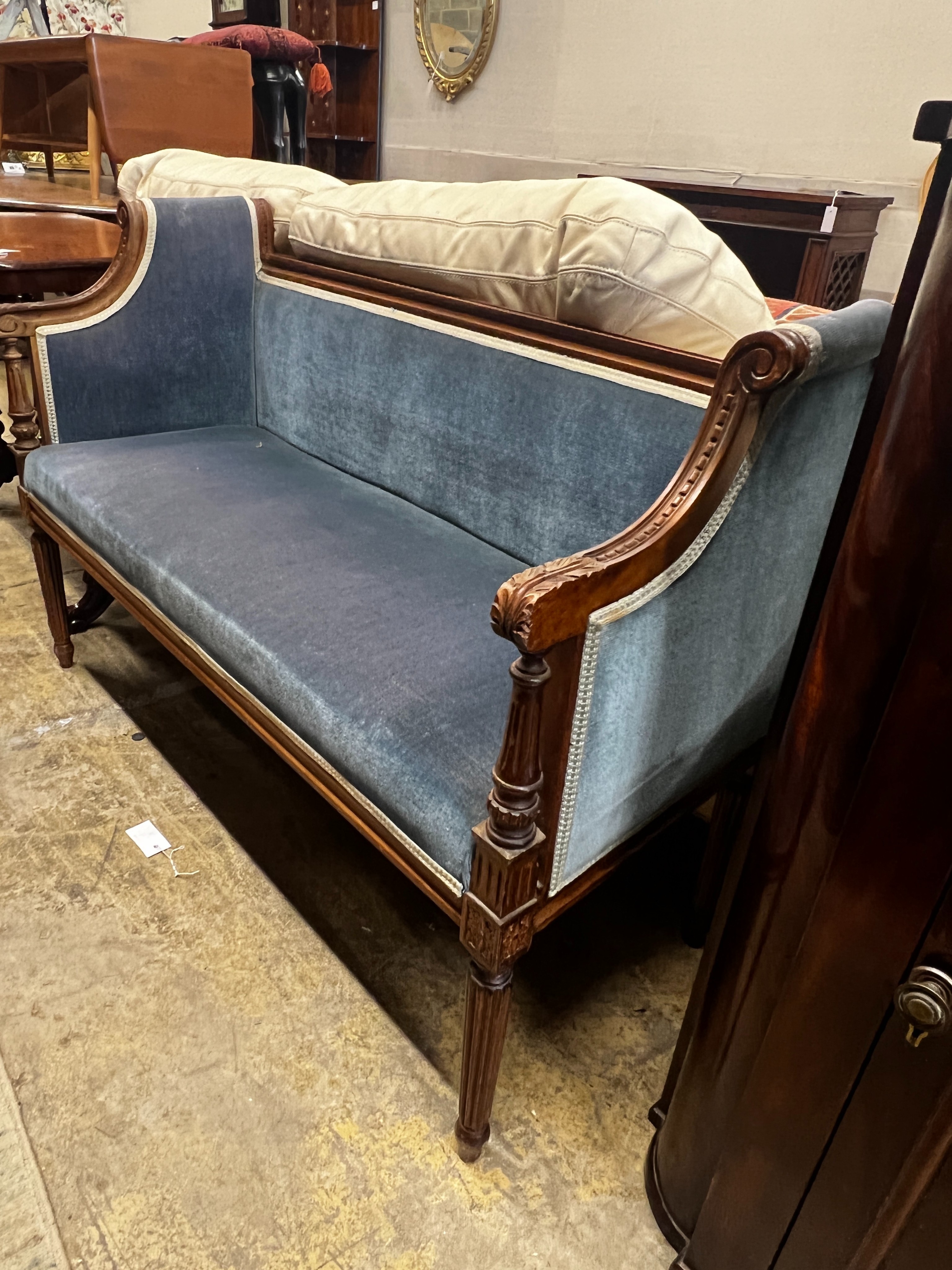A late 19th century French upholstered carved beech settee, length 120cm, width 47cm, height 79cm